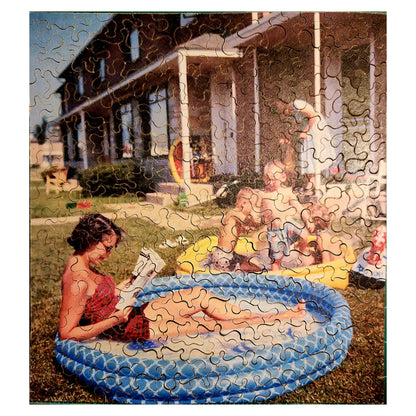 Woman Relaxing in an Inflatable Pool, 1956