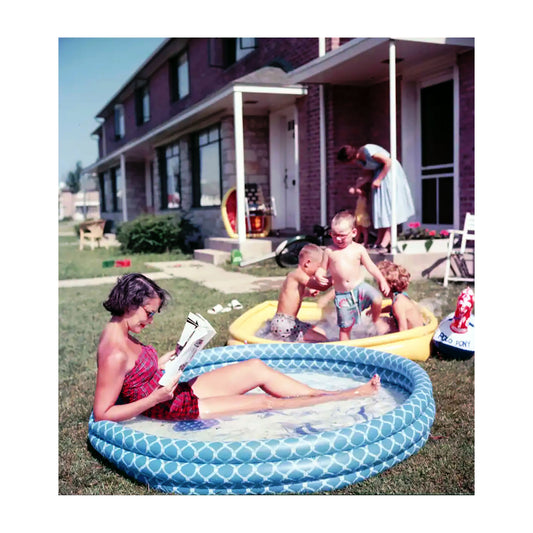 Woman Relaxing in an Inflatable Pool, 1956